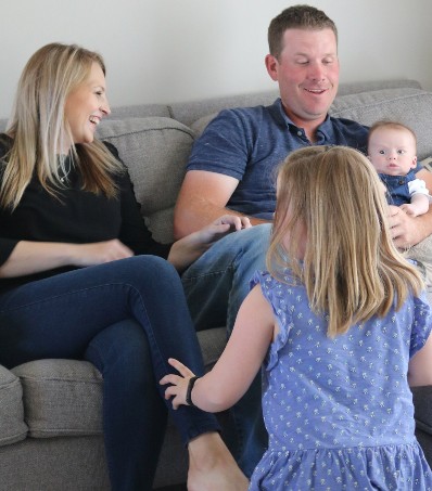 Young family on couch