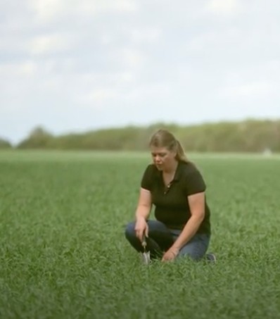 Farming woman in a field