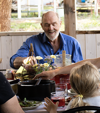 Farmer at the head of the table